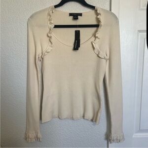 August Silk Cream Ruffled Trim Fitted
Ribbed Top